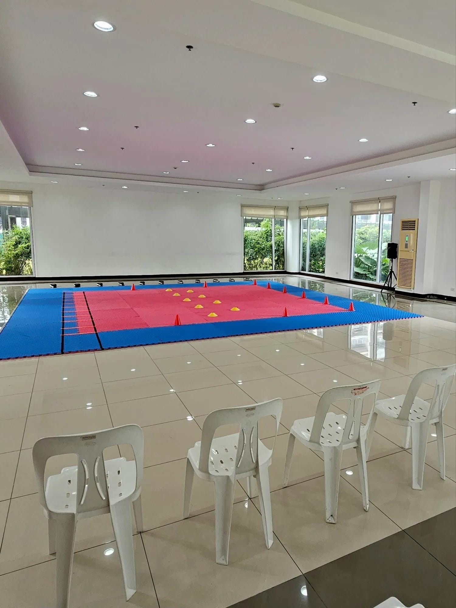 The Arca South clubhouse training room with mats laid out